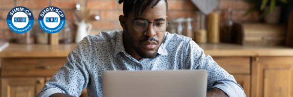 Woman sitting at a computer