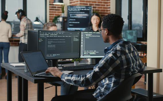 Software developer working on computers